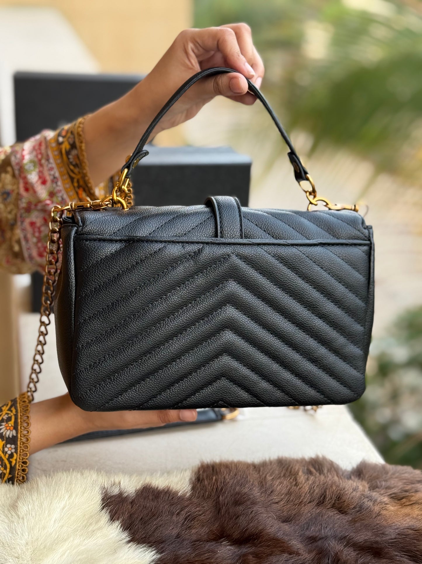 YSL Saint Lauren College.