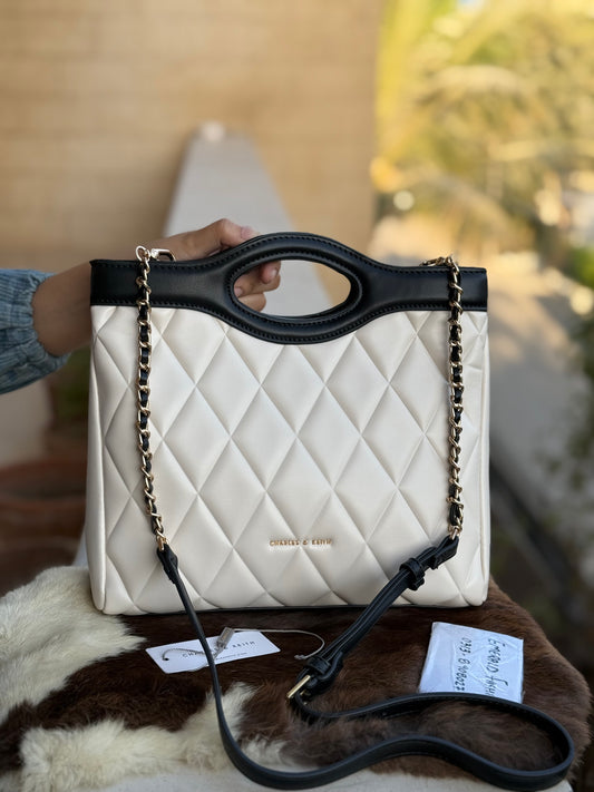 Charles & Keith Arwen Quilted Curved-handle bag Cream