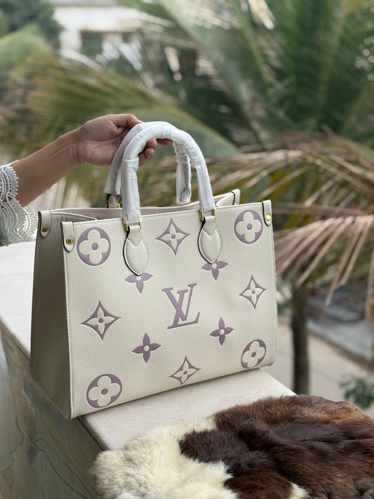 Louis Vuitton On the go MM Master Series.