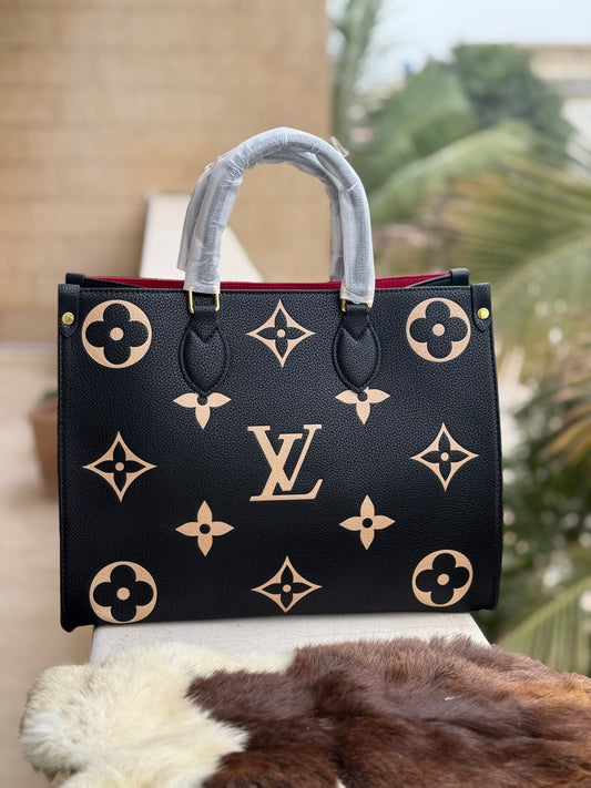 Louis Vuitton On the go MM Master Series.
