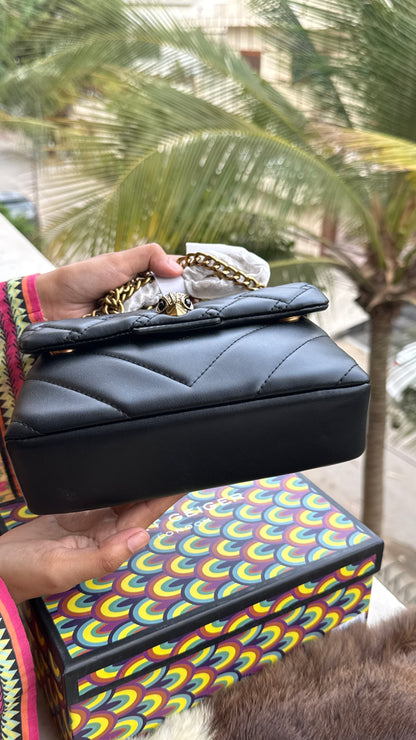 Kurt Geiger London Kensington Mini Quilted Shoulder Bag, featuring signature gold-tone hardware and a crystal-embellished eagle head-Master Series-Box included