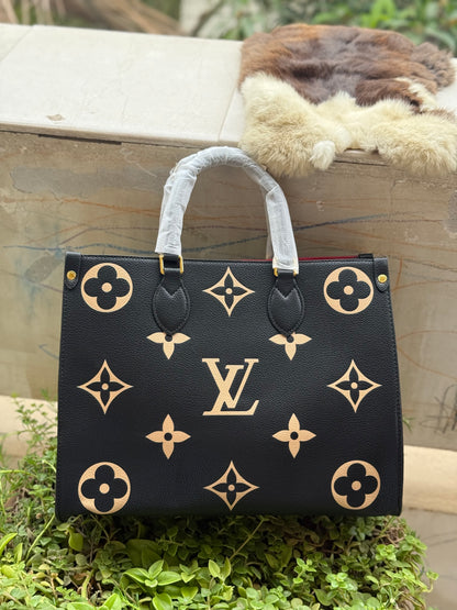 Louis Vuitton On the go MM Master Series.