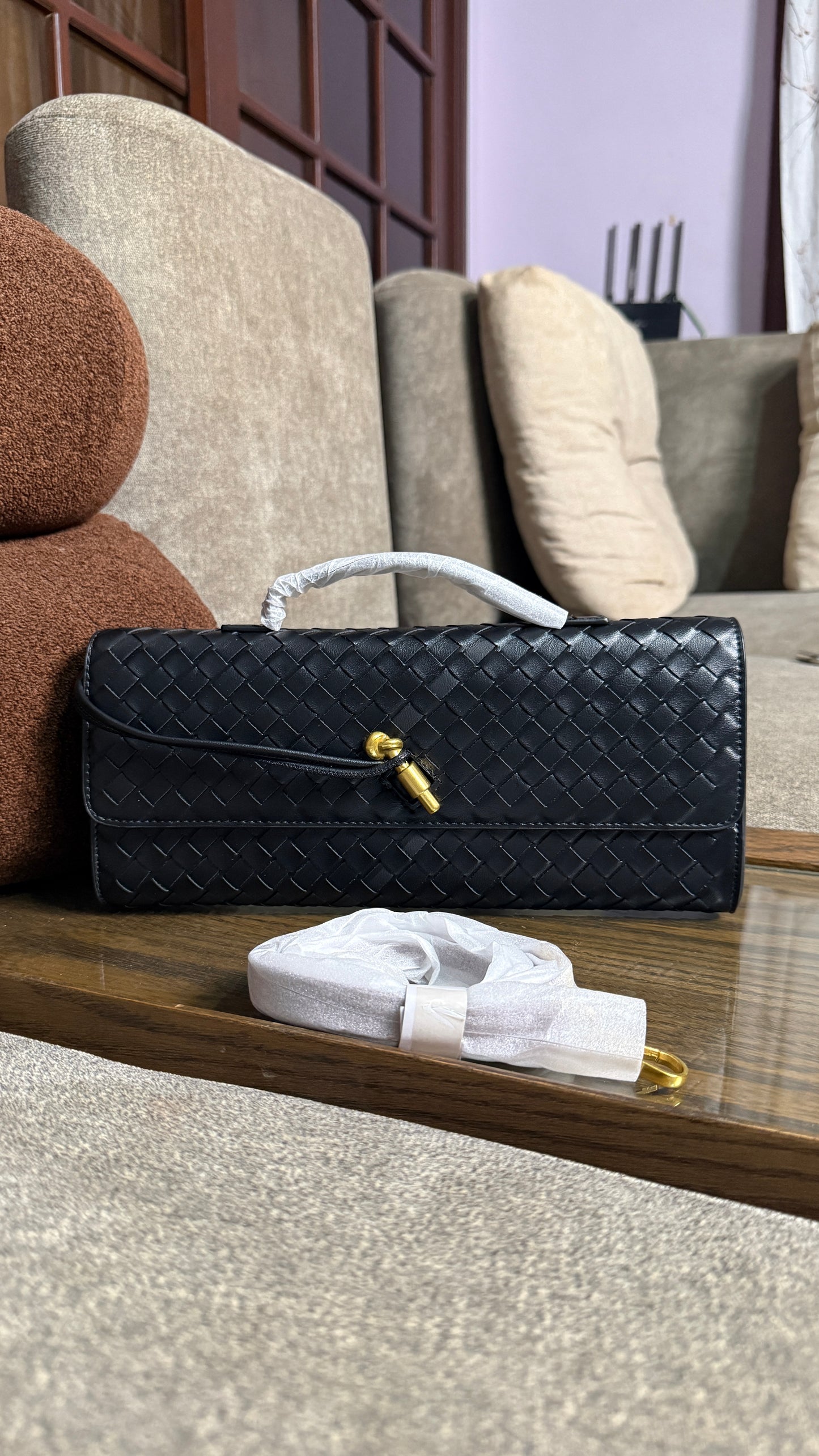 Bottega Venetta Andiamo Clutch.