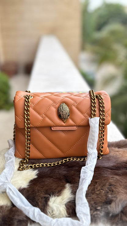 Kurt Geiger London Kensington Mini Quilted Shoulder Bag, featuring signature gold-tone hardware and a crystal-embellished eagle head-Master Series-Box included