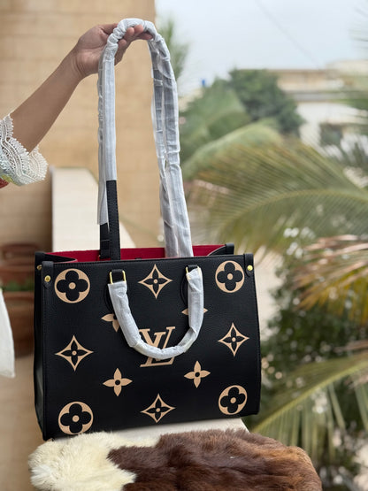 Louis Vuitton On the go MM Master Series.
