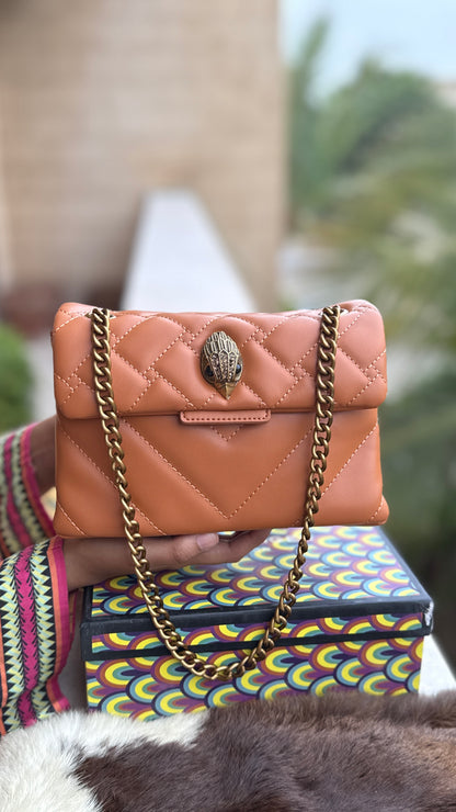 Kurt Geiger London Kensington Mini Quilted Shoulder Bag, featuring signature gold-tone hardware and a crystal-embellished eagle head-Master Series-Box included