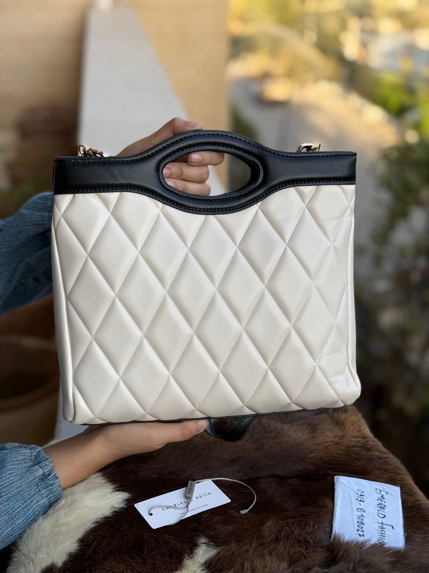 Charles & Keith Arwen Quilted Curved-handle bag Cream