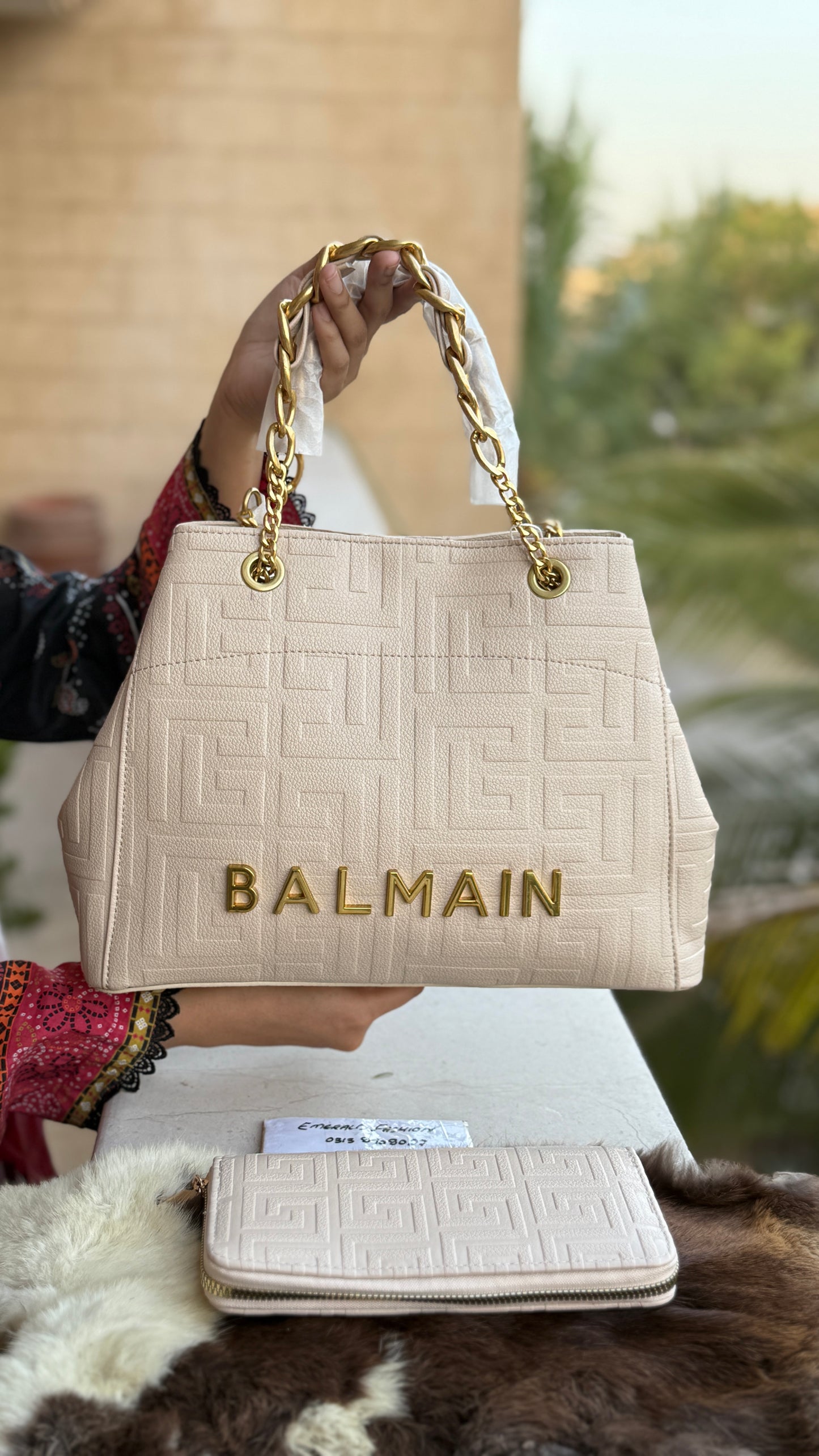 BALMAIN medium Tote With Balmain clutch.