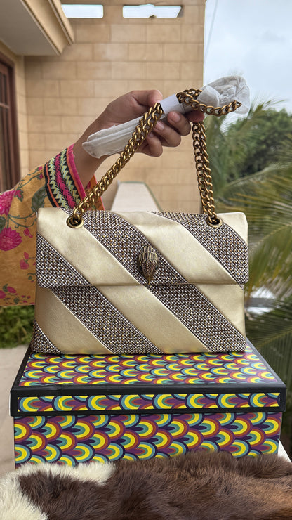 Kurt Geiger London Kensington bag featuring a gold satin and crystal-embellished design.Master Series-With box