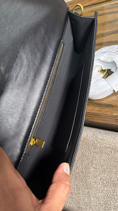 Bottega Venetta Andiamo Clutch.