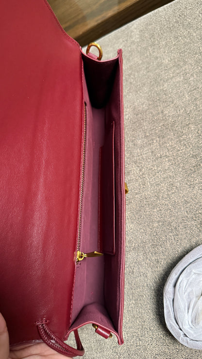 Bottega Venetta Andiamo Clutch.