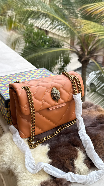 Kurt Geiger London Kensington Mini Quilted Shoulder Bag, featuring signature gold-tone hardware and a crystal-embellished eagle head-Master Series-Box included
